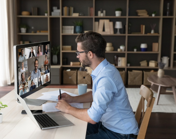 man working from home on laptop
